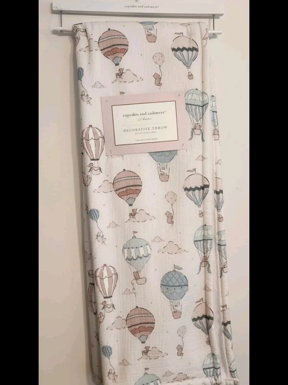 cupcakes & cashmere Cream Throw with Pastel Blue and Muted Pink Hot Air Balloons